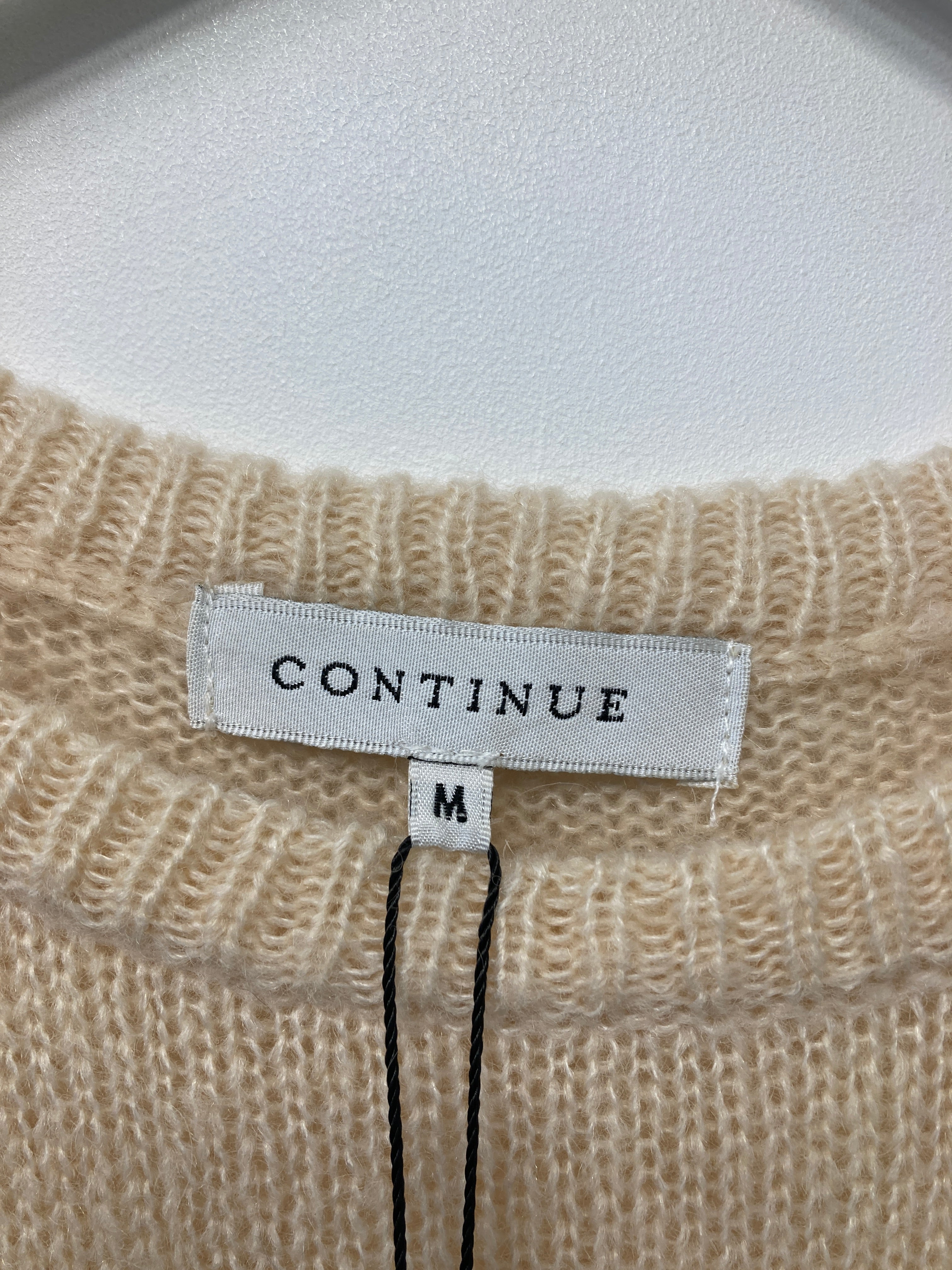 Continue Vest